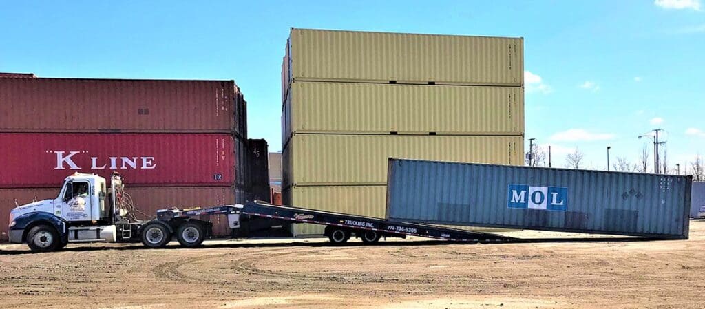 Truck moving a shipping container