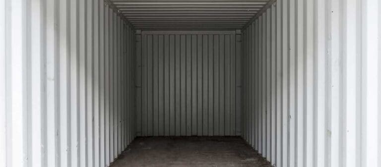 Plywood floors on the interior of a shipping container.