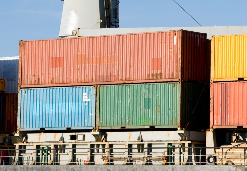 Side-by-side comparison of 20 ft vs 40 ft shipping containers at Depot.
