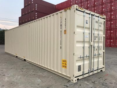 New high cube 40 ft shipping container. Beige in color.